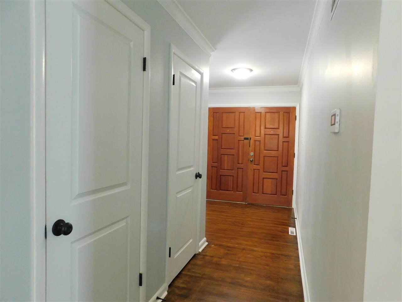 990 Blanchard Road Memphis, TN 38116 - Photo 4 of 25 Beautiful wooden double doors and double coat closets.