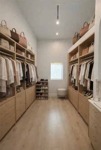 a view of an empty room with windows