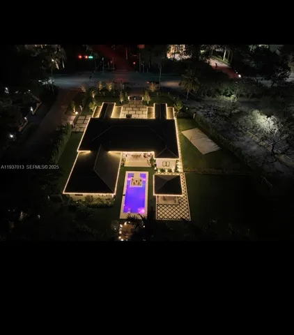 a car parked in front of the house