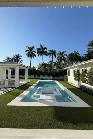 a view of a house with swimming pool
