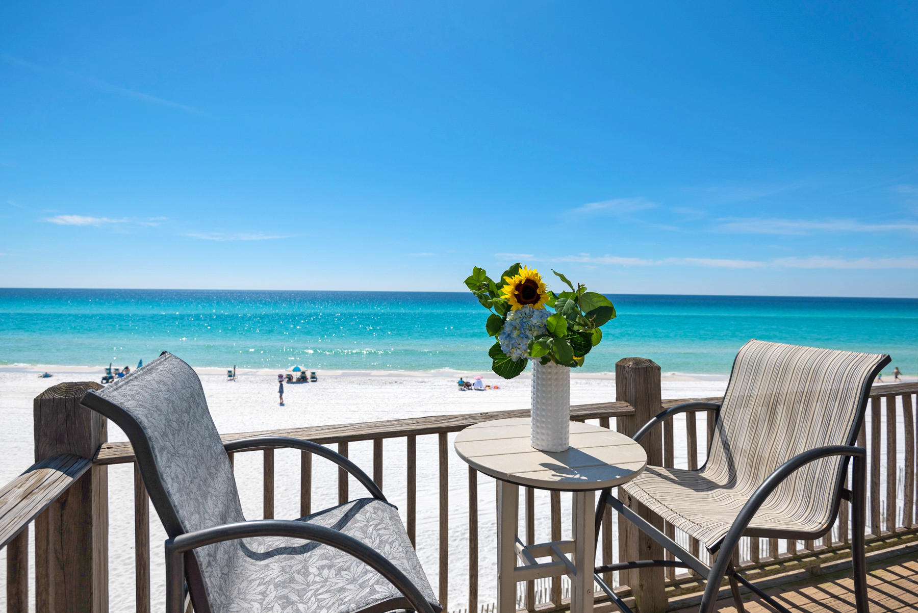 681 Eastern Lake Road, Unit 3 & 4 Santa Rosa Beach, FL 32459 - Photo 1 of 65 a view of a chairs and table in the patio