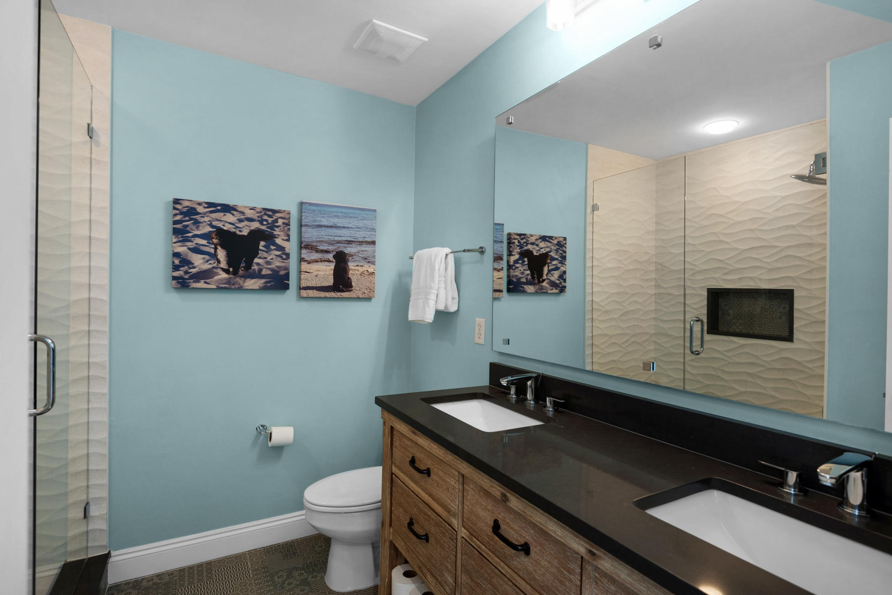 681 Eastern Lake Road, Unit 3 & 4 Santa Rosa Beach, FL 32459 - Photo 20 of 65 a bathroom with a sink a toilet and mirror