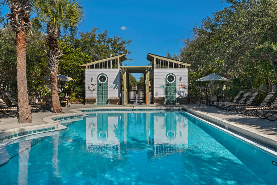 681 Eastern Lake Road, Unit 3 & 4 Santa Rosa Beach, FL 32459 - Photo 31 of 65 a view of a house with pool and chairs