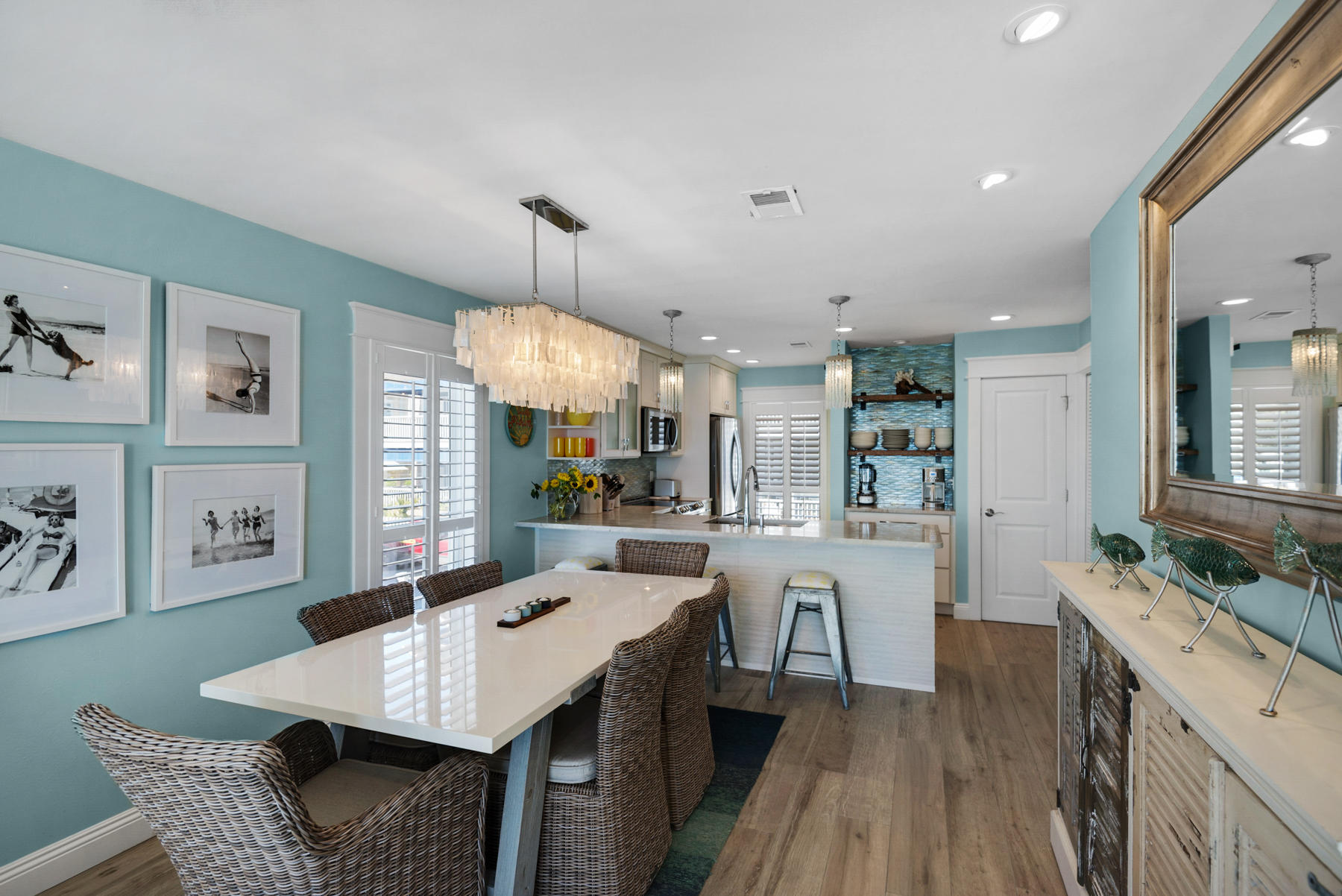 681 Eastern Lake Road, Unit 3 & 4 Santa Rosa Beach, FL 32459 - Photo 9 of 65 a large kitchen with a table and chairs