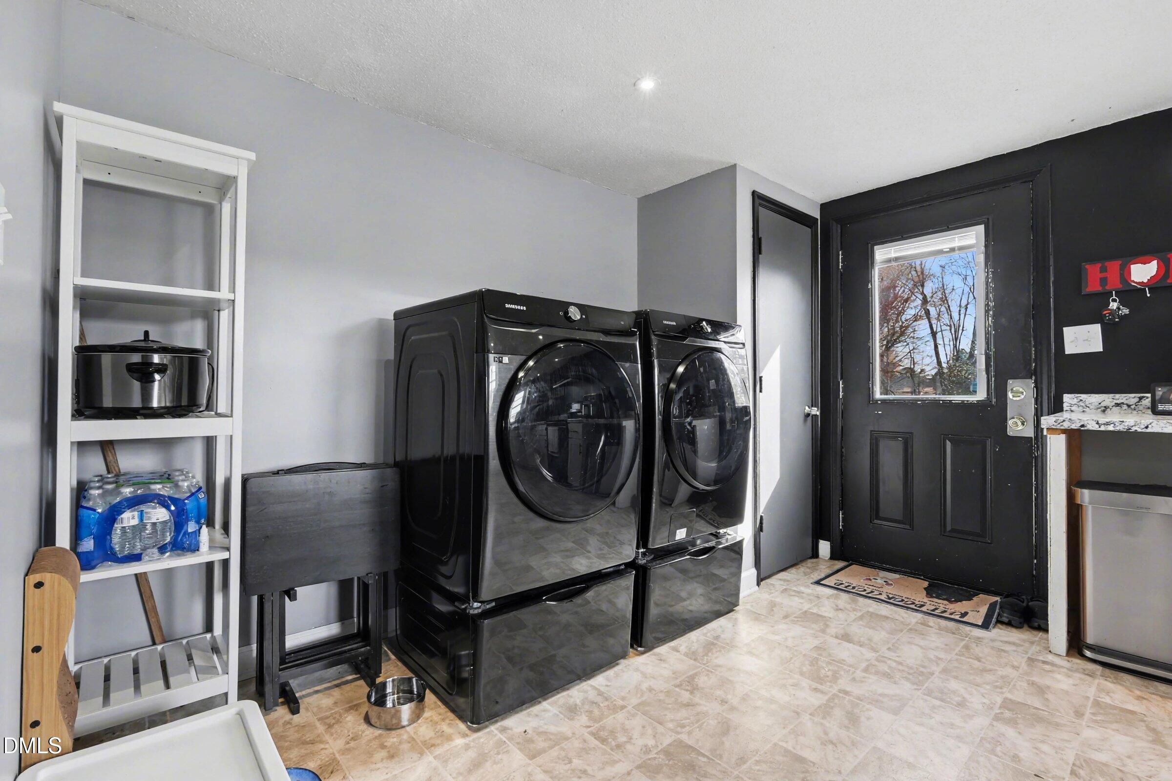5776 Pearces Road Louisburg, NC 27549 - Photo 25 of 32 a view of a livingroom with furniture and closet area