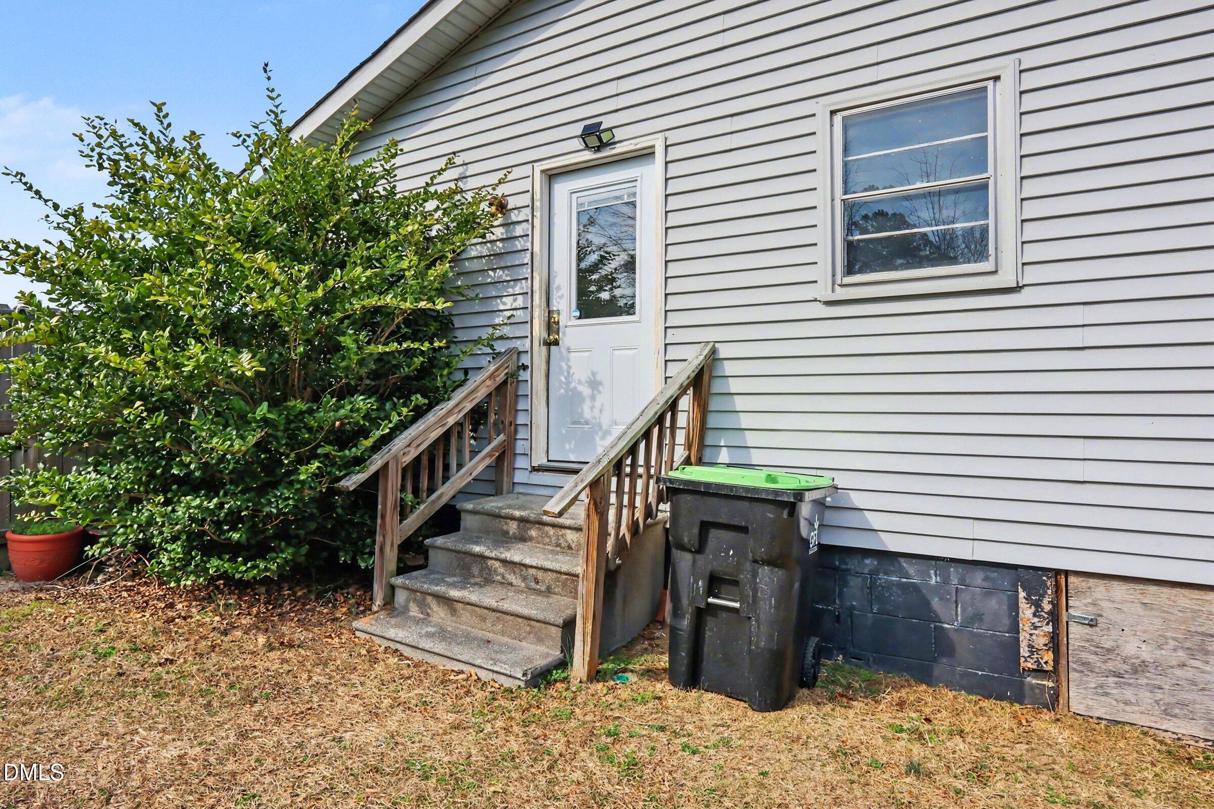 5776 Pearces Road Louisburg, NC 27549 - Photo 26 of 32 a view of a house with entertaining space