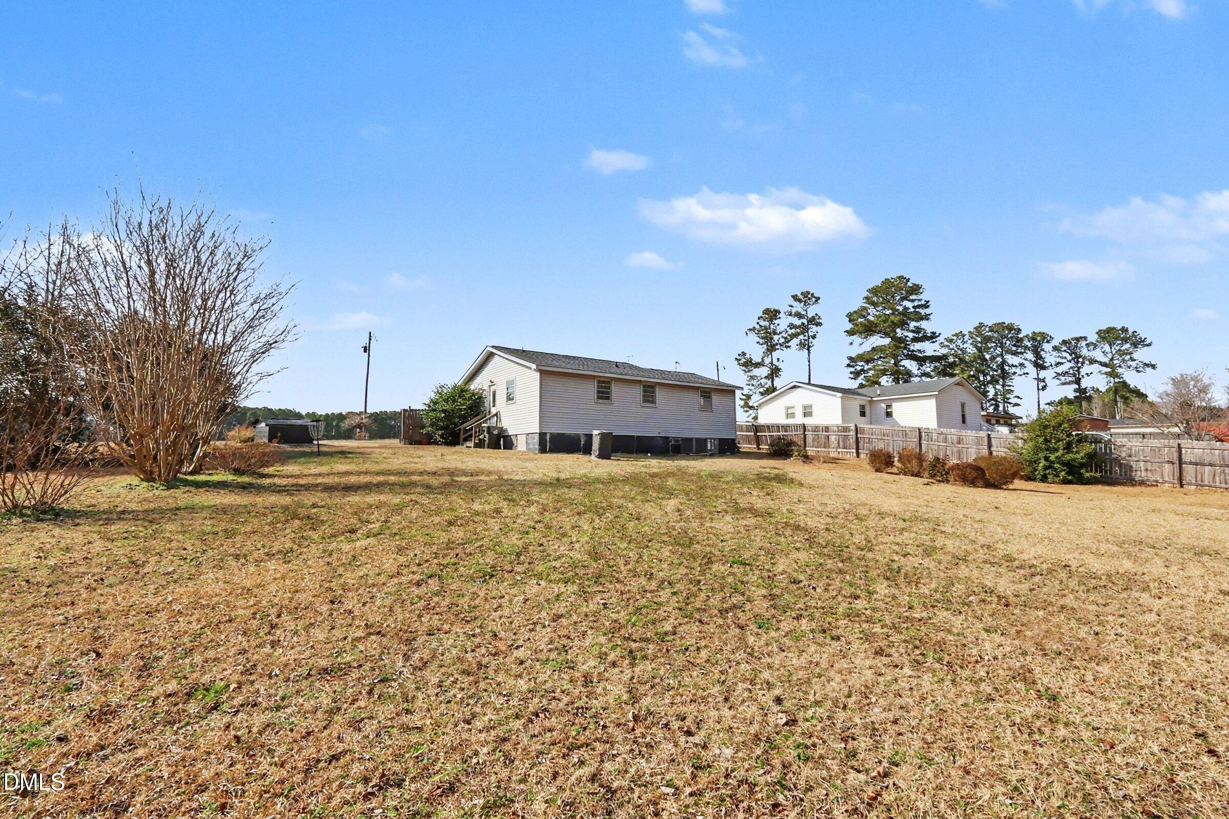 5776 Pearces Road Louisburg, NC 27549 - Photo 29 of 32 a house view with a outdoor space