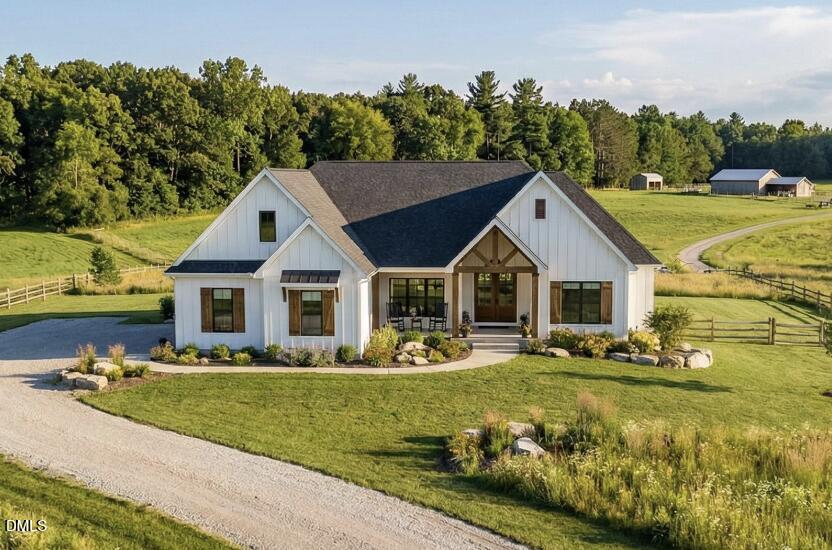 2785 River Meadow Spring Hope, NC 27882 - Photo 7 of 11 a front view of house with yard and green space