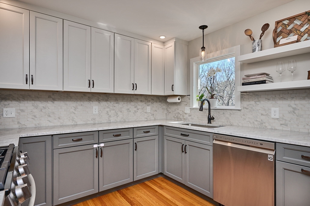 69 High Street Southampton, MA 01073 - Photo 11 of 40 a kitchen with a sink cabinets and window