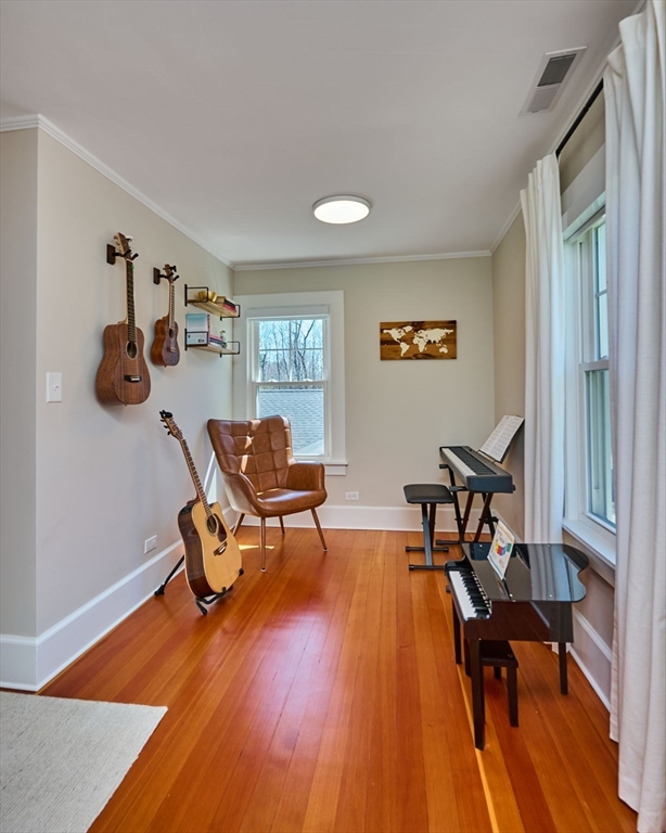 69 High Street Southampton, MA 01073 - Photo 19 of 40 a living room with furniture and a wooden floor