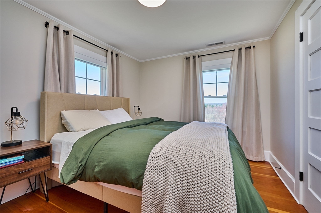 69 High Street Southampton, MA 01073 - Photo 20 of 40 a bedroom with a bed and a window