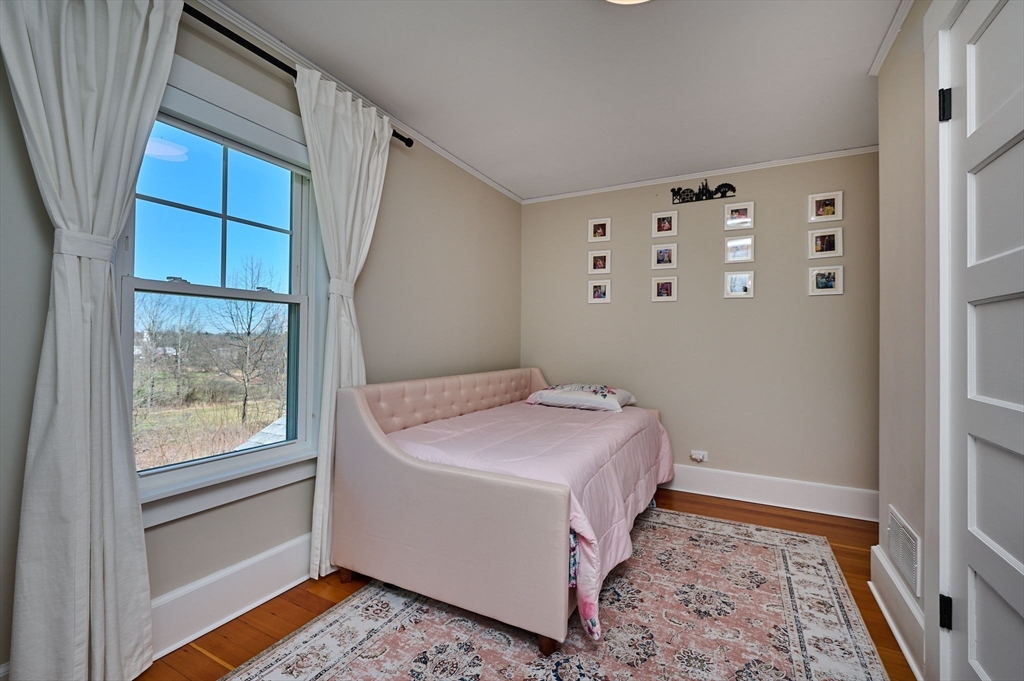 69 High Street Southampton, MA 01073 - Photo 22 of 40 a bedroom with a bed and a window
