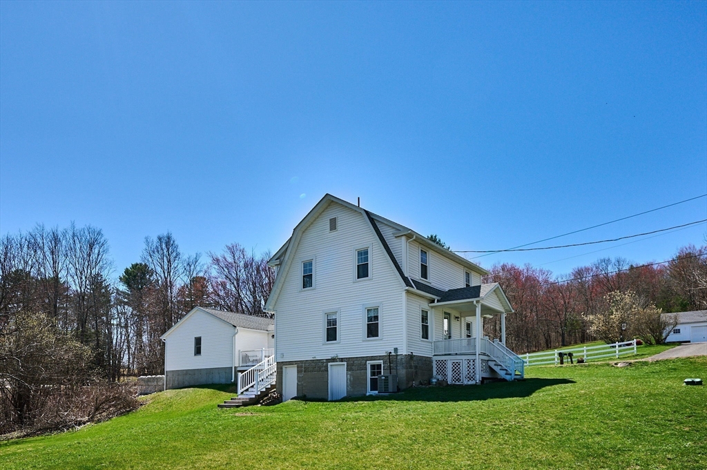 69 High Street Southampton, MA 01073 - Photo 29 of 40 a view of a house with a yard