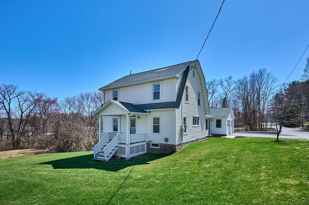 69 High Street Southampton, MA 01073 - Photo 3 of 40 a view of a house with a big yard