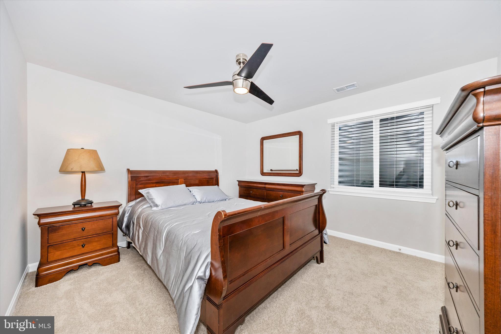 700 Bond Street Frederick, MD 21701 - Photo 35 of 49 a bed room with a bed and a night stand