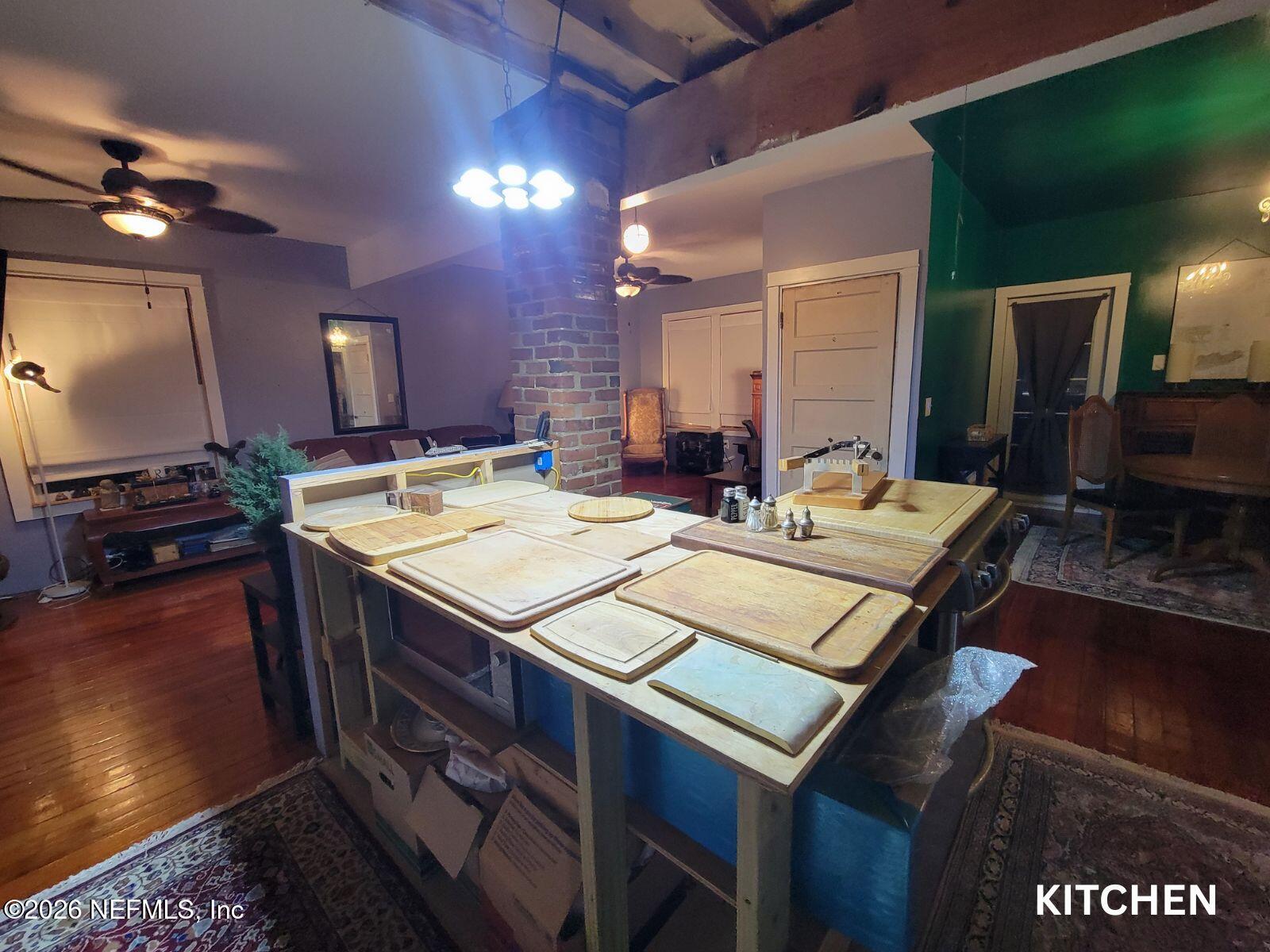216 Summit Street Crescent City, FL 32112 - Photo 32 of 46 a view of a dining room with furniture and a chandelier