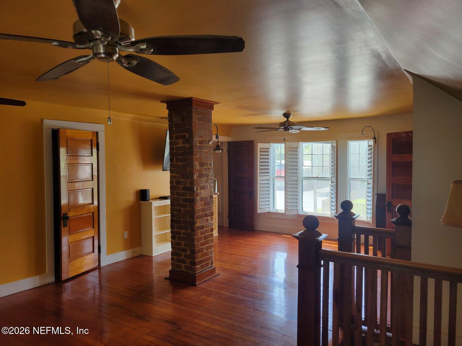 216 Summit Street Crescent City, FL 32112 - Photo 6 of 46 a view of a livingroom with wooden floor and furniture