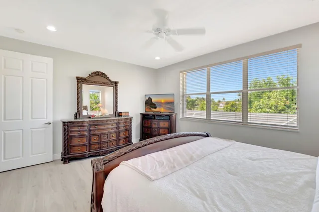 a view of a lake with a house in the background