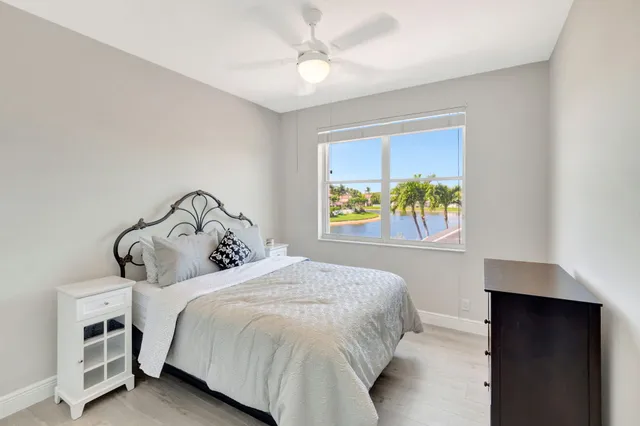 a view of a room with pool table and chairs