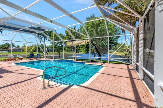 a view of outdoor space with swimming pool