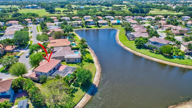 a view of a livingroom with workspace and a window
