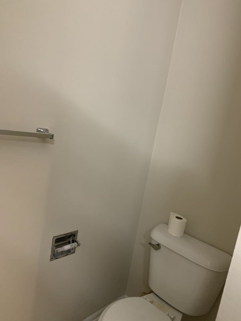 923 LaGrange Road La Grange, IL 60525 - Photo 11 of 22 a bathroom with a toilet and a mirror