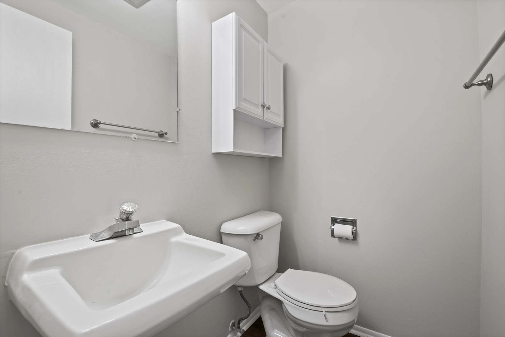 923 LaGrange Road La Grange, IL 60525 - Photo 6 of 22 a bathroom with a sink a toilet and mirror