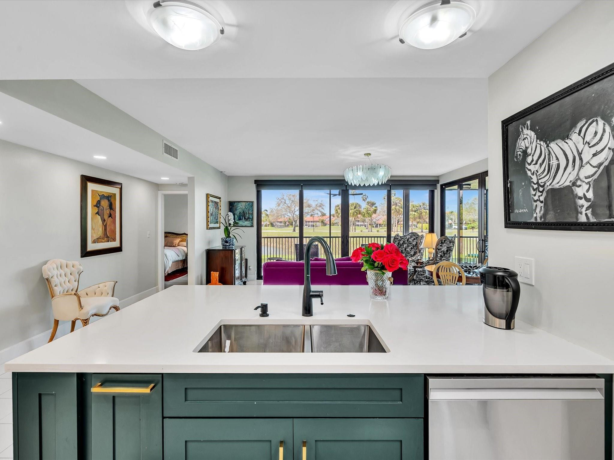 7642 Elm Ridge Drive, Unit 14L Boca Raton, FL 33433 - Photo 23 of 69 a bathroom with a sink and a mirror