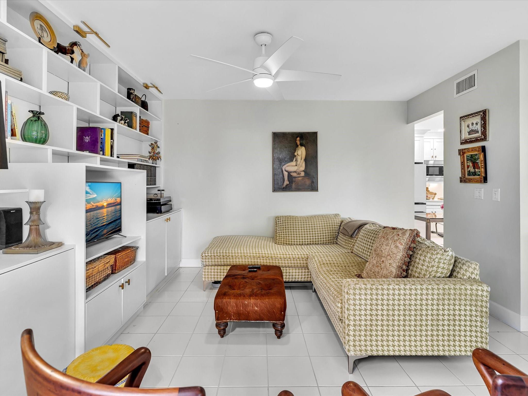 7642 Elm Ridge Drive, Unit 14L Boca Raton, FL 33433 - Photo 26 of 69 a living room with furniture and a couch