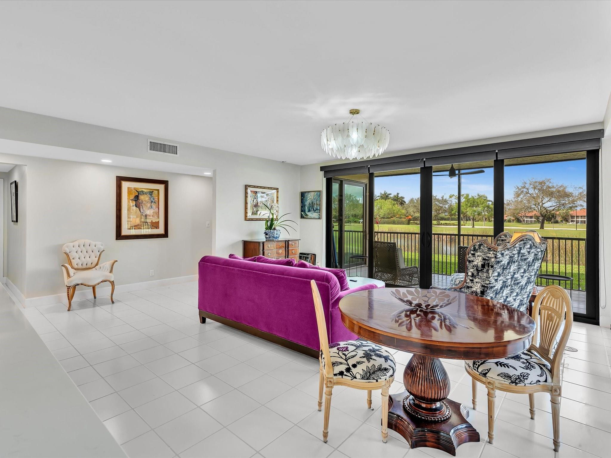 7642 Elm Ridge Drive, Unit 14L Boca Raton, FL 33433 - Photo 30 of 69 a workspace with furniture and a large window