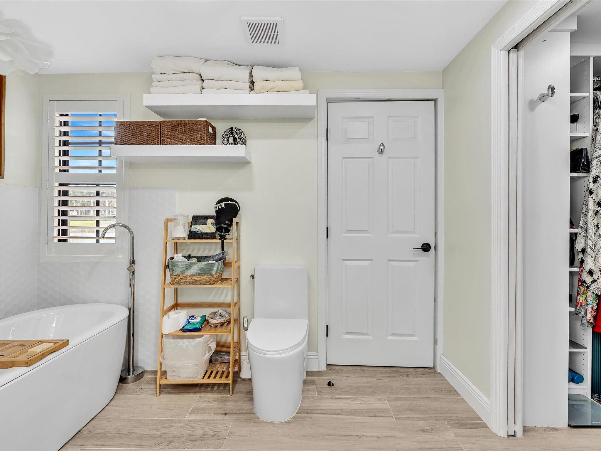 7642 Elm Ridge Drive, Unit 14L Boca Raton, FL 33433 - Photo 52 of 69 a view of bathroom with bathtub and shower