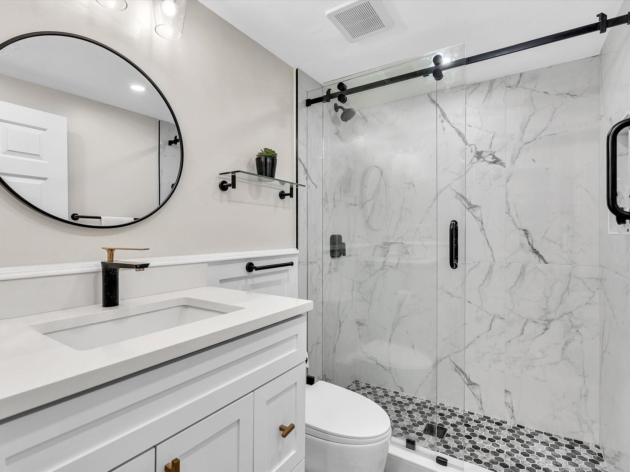 7642 Elm Ridge Drive, Unit 14L Boca Raton, FL 33433 - Photo 56 of 69 a bathroom with a sink toilet and shower