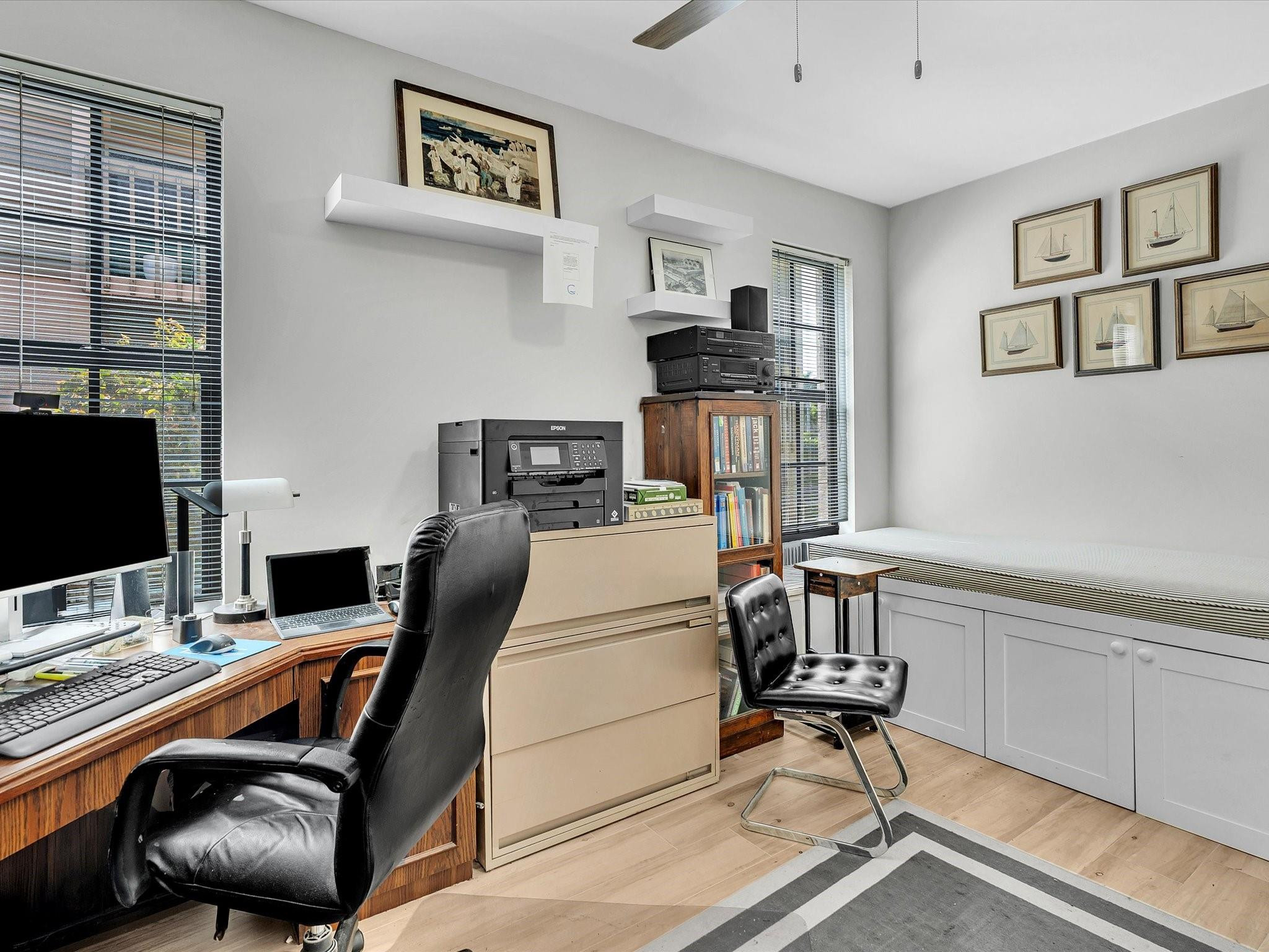 7642 Elm Ridge Drive, Unit 14L Boca Raton, FL 33433 - Photo 59 of 69 a work room with furniture and windows