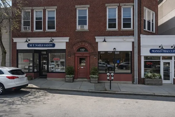 a front view of a building with street