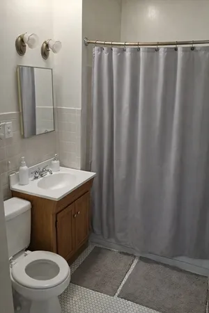 a bathroom with a sink and a toilet