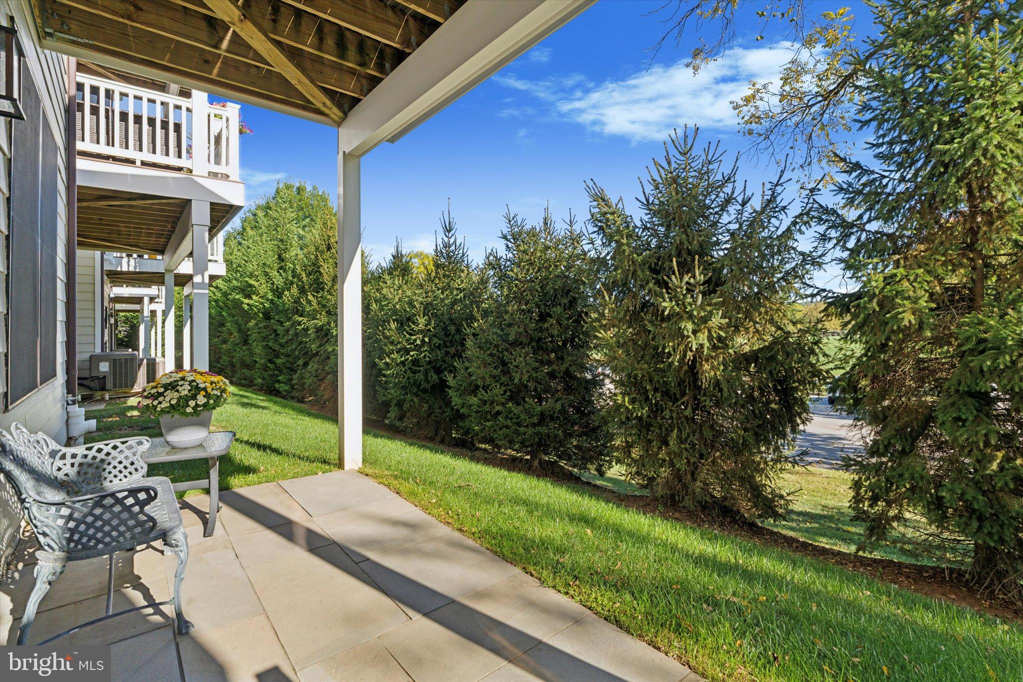 50 Parkview Cir. Wayne, PA 19087 - Photo 36 of 43 Patio with tree lined border for privacy