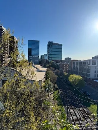 a view of a balcony with city view