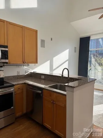 a white toilet sitting next to a shower