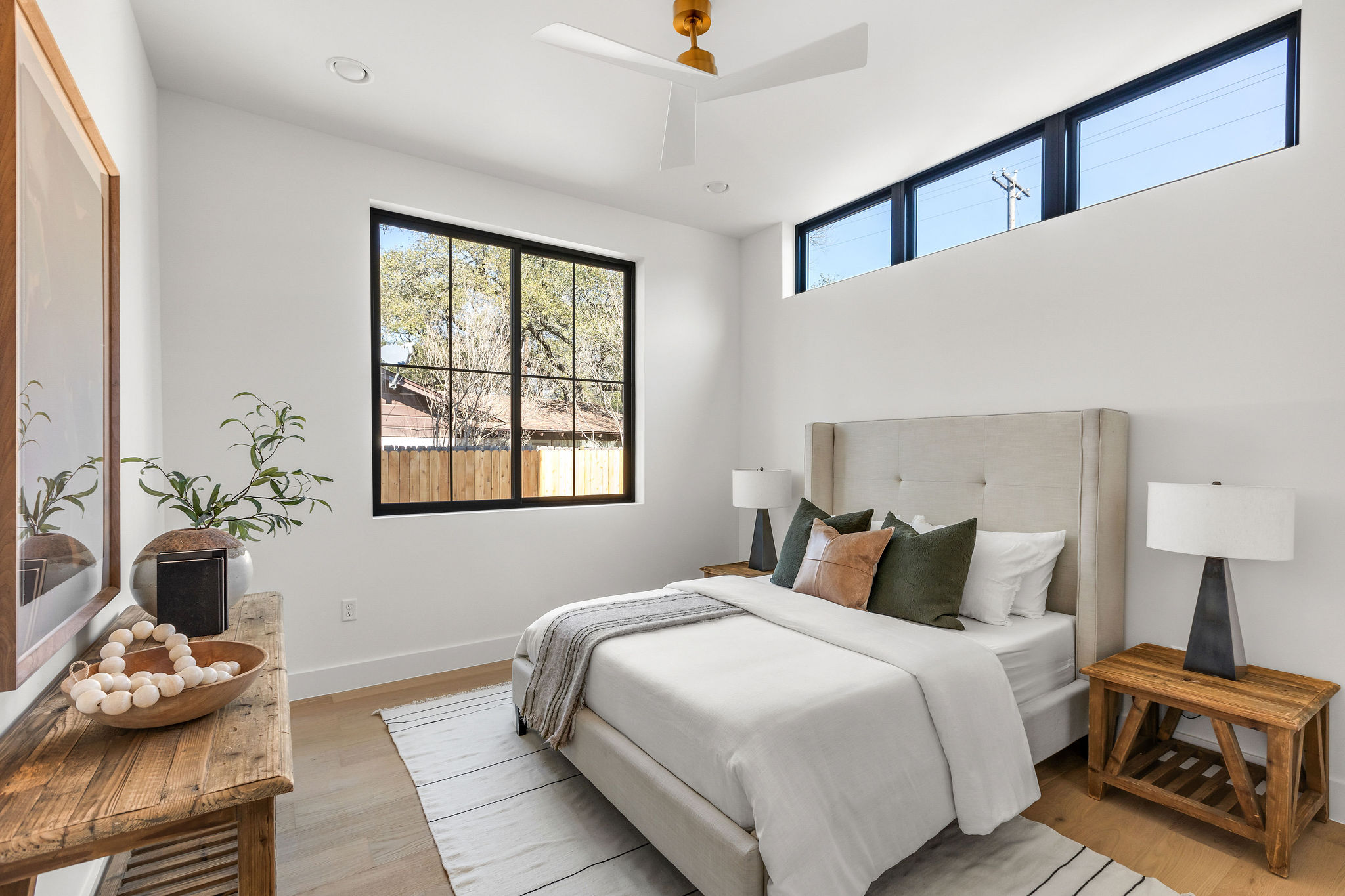 8307 Silver Ridge Drive Austin, TX 78759 - Photo 19 of 27 Bedroom featuring light wood-style flooring, ceiling fan, multiple windows, and recessed lighting