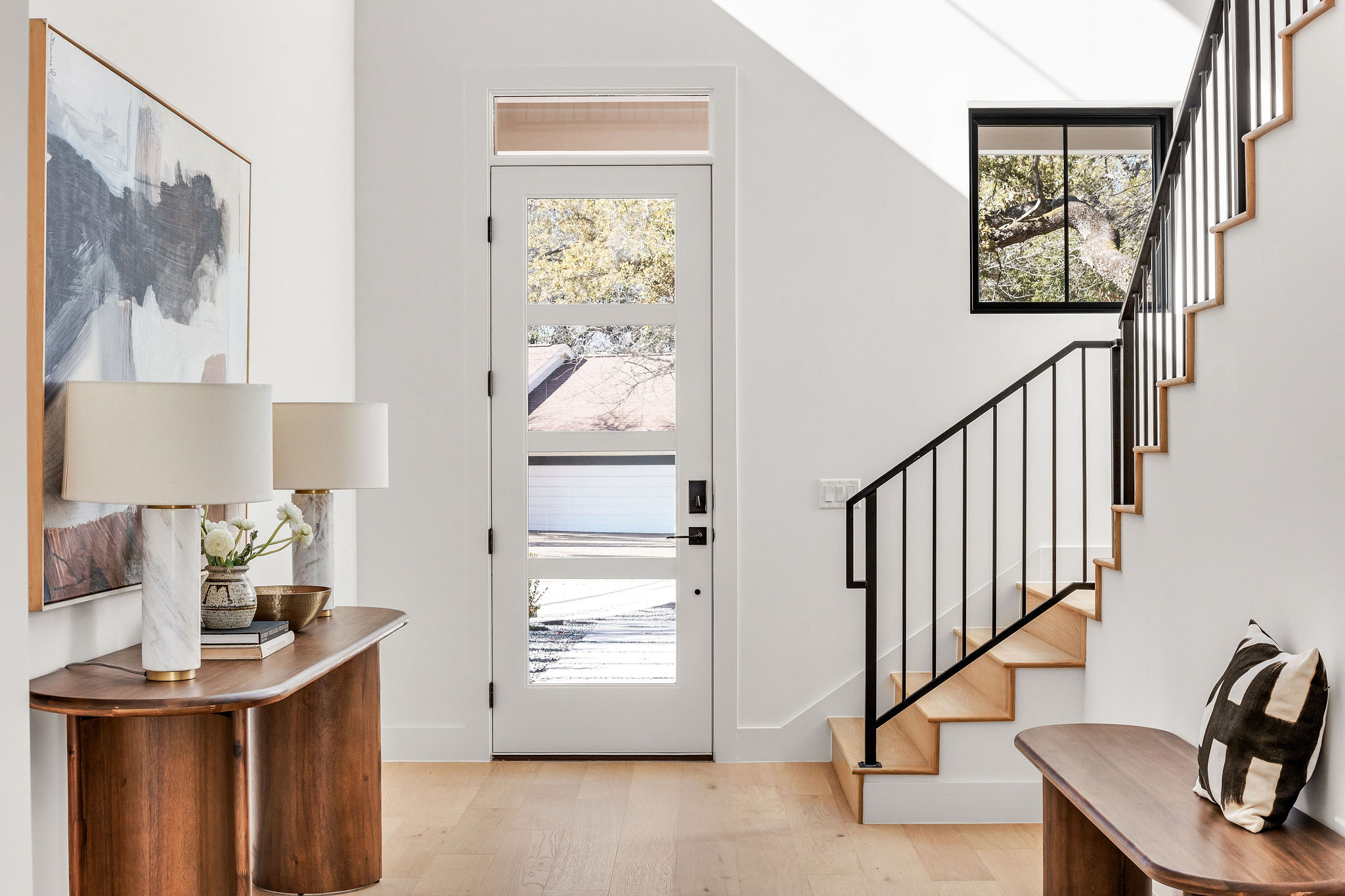 8307 Silver Ridge Drive Austin, TX 78759 - Photo 2 of 27 Entryway with light wood-style floors and plenty of natural light