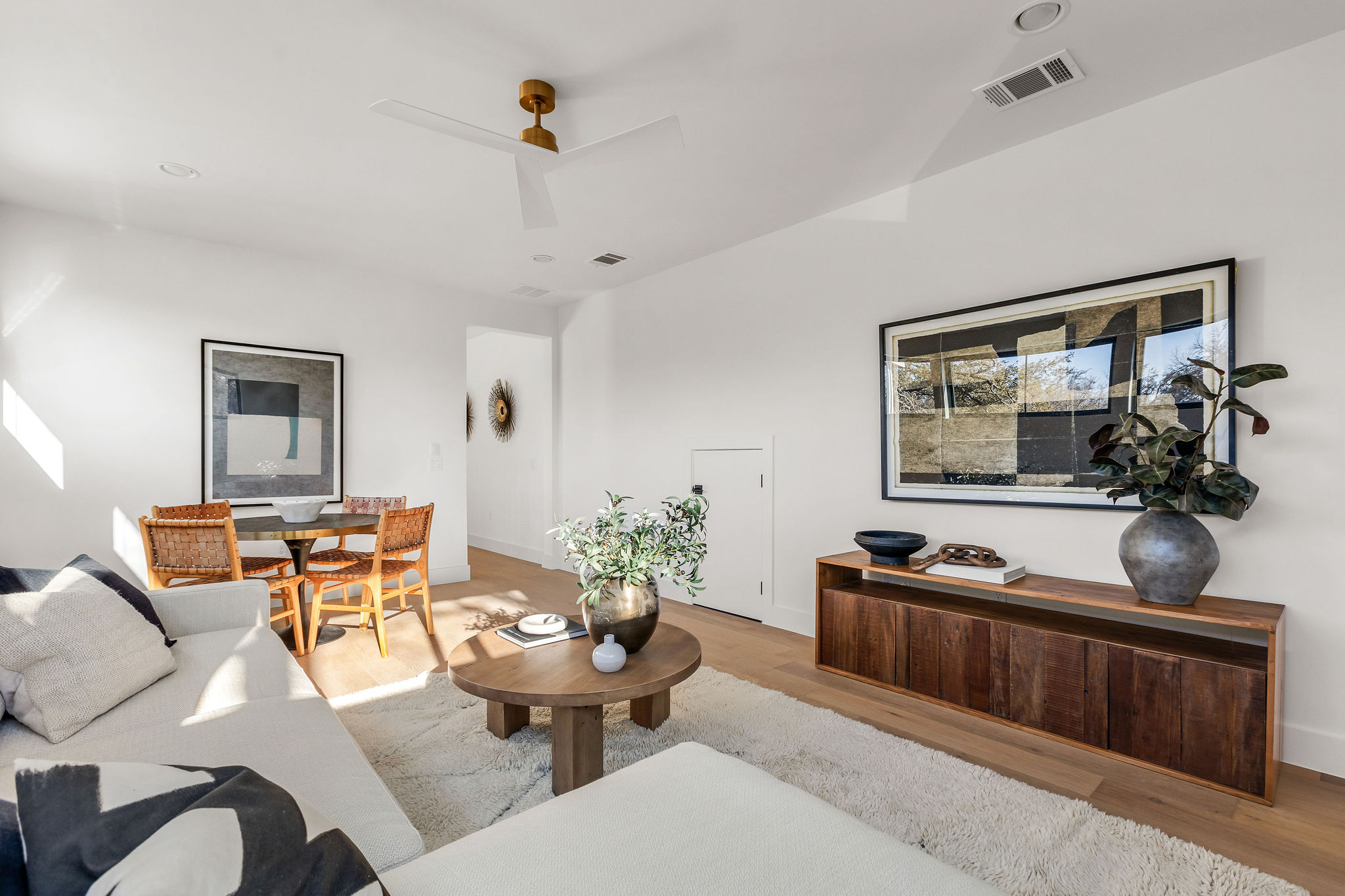 8307 Silver Ridge Drive Austin, TX 78759 - Photo 23 of 27 Living area with wood finished floors and ceiling fan