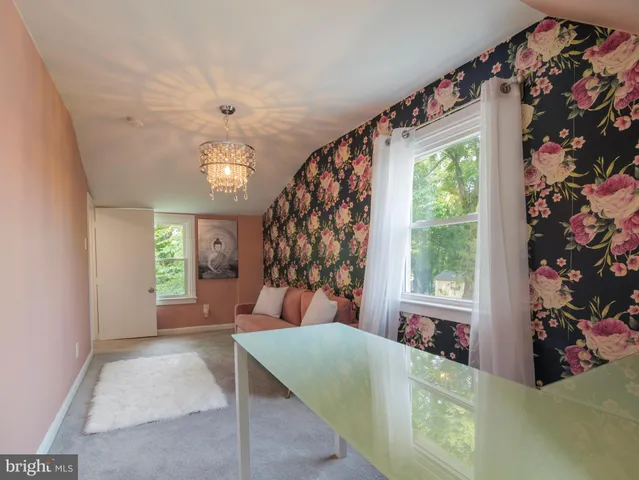 a view of a living room and window