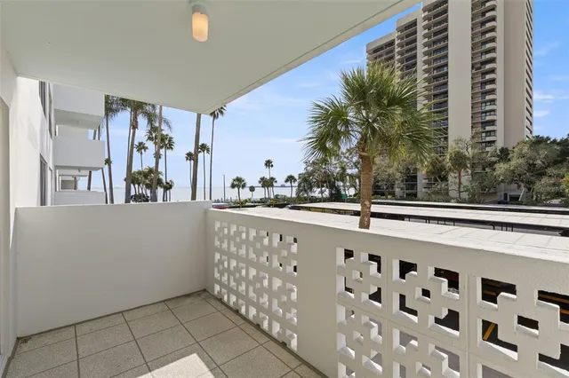 a view of a patio with swimming pool