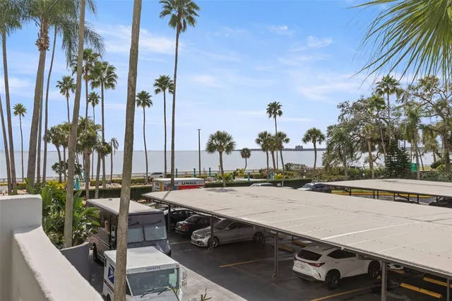 a view of a swimming pool with a lounge chairs