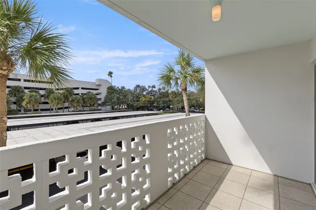 a view of a swimming pool and a yard