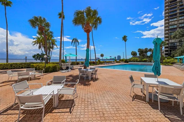 a view of a balcony with plants