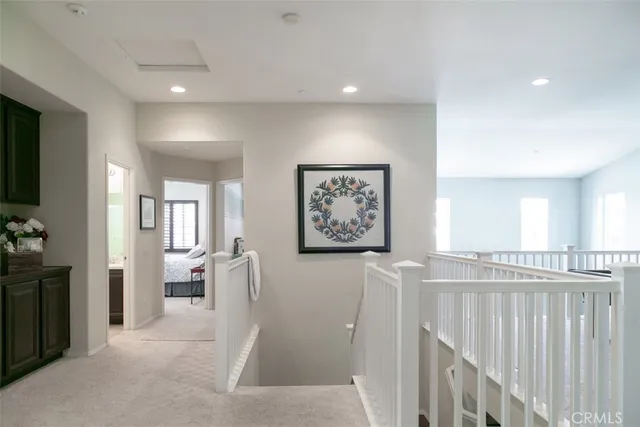 a view of a hallway with workspace