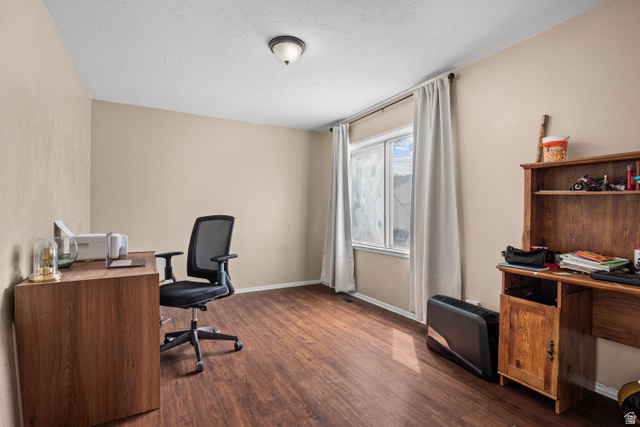 88 East C Street Springville, UT 84663 - Photo 17 of 32 Interior room featuring wood-finish flooring, neutral wall tones, and a window with white trim