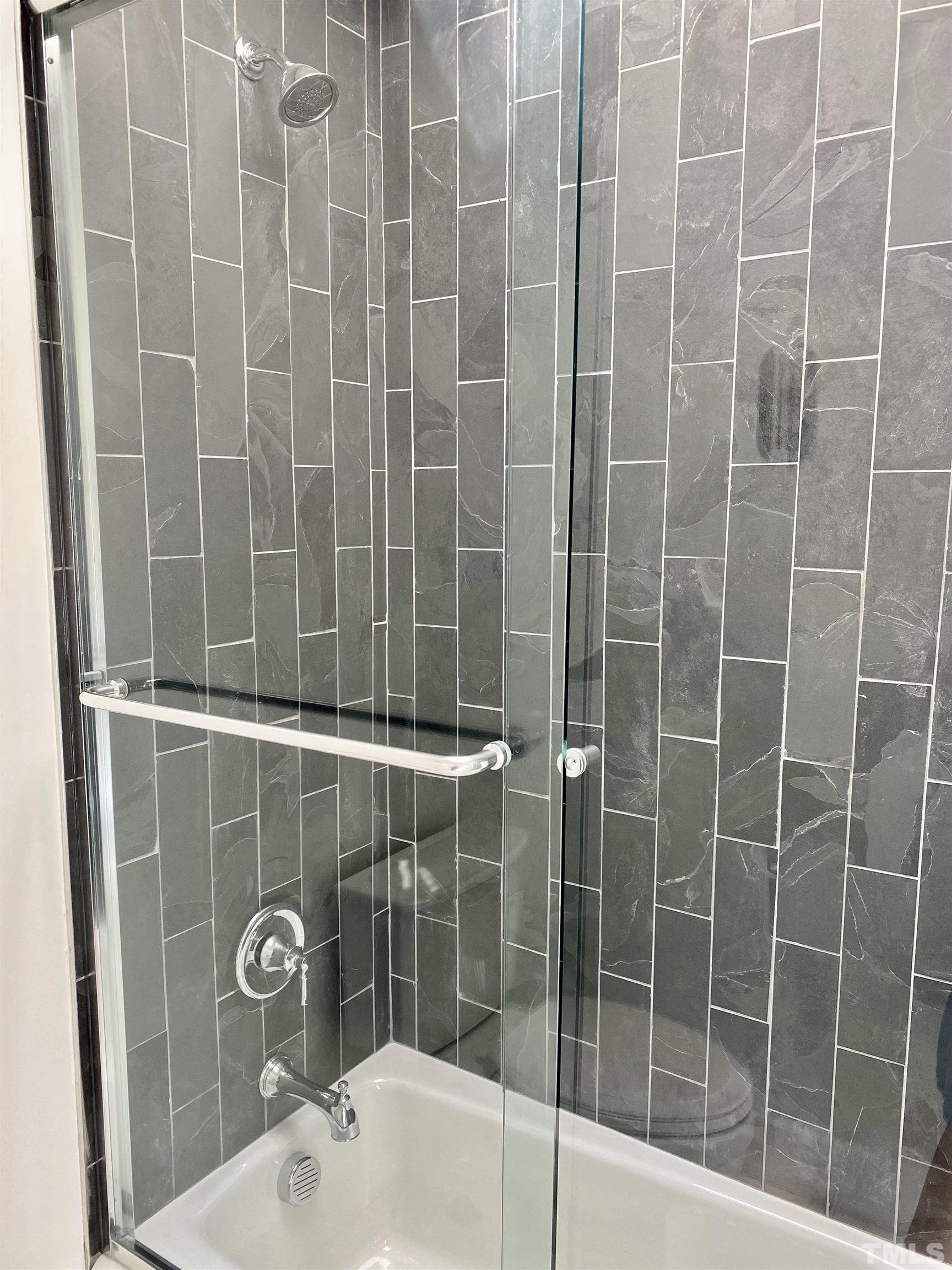 3806 Regent Road Durham, NC 27707 - Photo 17 of 21 a bathroom with a shower and a sink