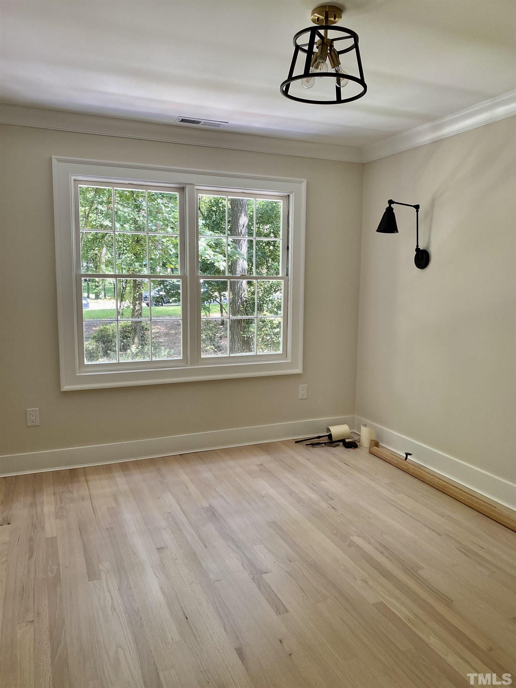 3806 Regent Road Durham, NC 27707 - Photo 18 of 21 a view of an empty room with a window